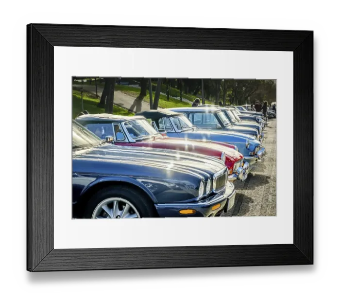 Framed Print : Lisbon, Portugal, Jan 20, 2024: A row of shiny vintage cars of Jaguar