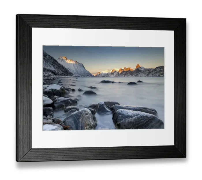 Framed Print : Norwegian fjord, snow-covered mountains at sunset