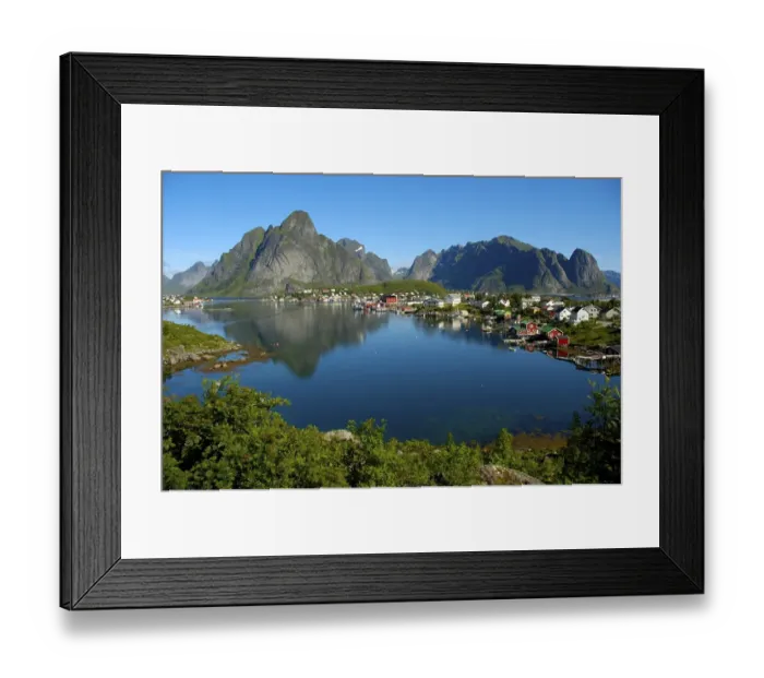 Framed Print : Mountains and houses reflect in the fjord Reine Moskenesoya Lofoten Norway