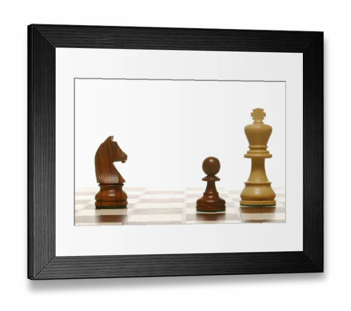 Framed Print : Chess pieces on a chess board, symbolic of strategy Framed Print : Chess pieces on a chess board, symbolic of strategy