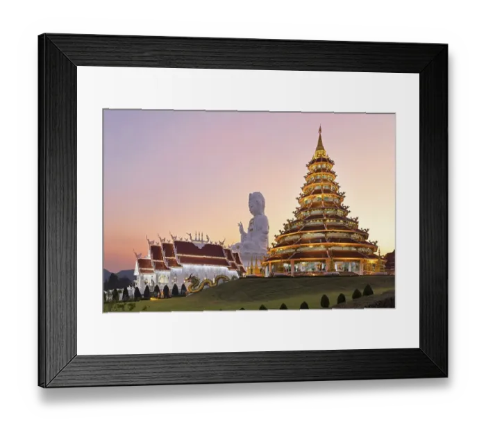 Framed Print : Nine-storey Chinese pagoda and chapel in front of huge Guan Yin statue at sunset