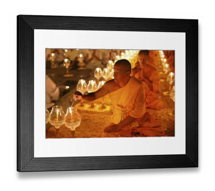 Framed Print : Monk lights candle, meditation Framed Print : Monk lights candle, meditation