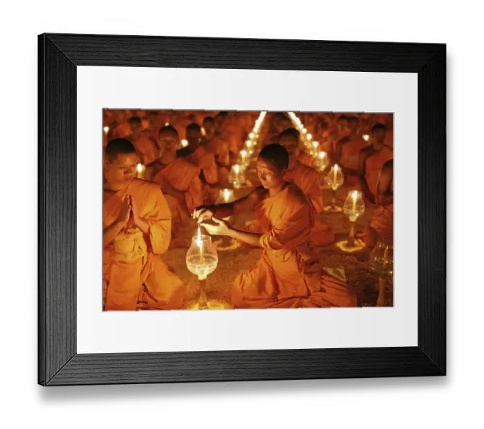 Framed Print : Monk lights candle, meditation Framed Print : Monk lights candle, meditation