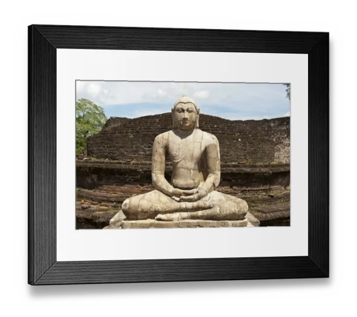 Framed Print : Seated Buddha statue made of stone in a meditation posture