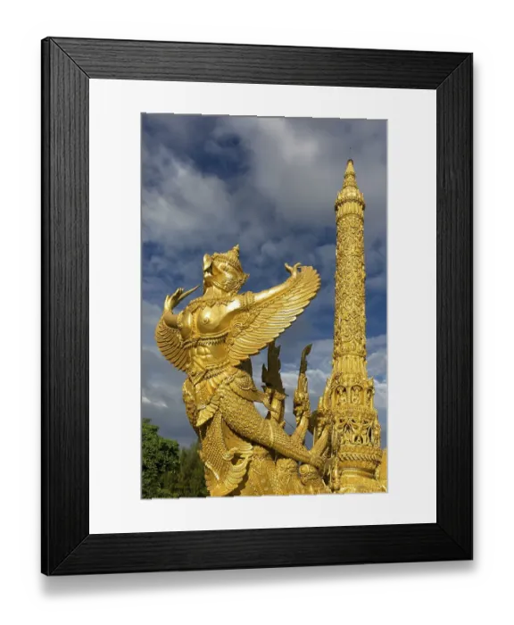 Framed Print : Thung Si Muang Park, Mueang, Garuda figure in front of the Golden Giant Candle