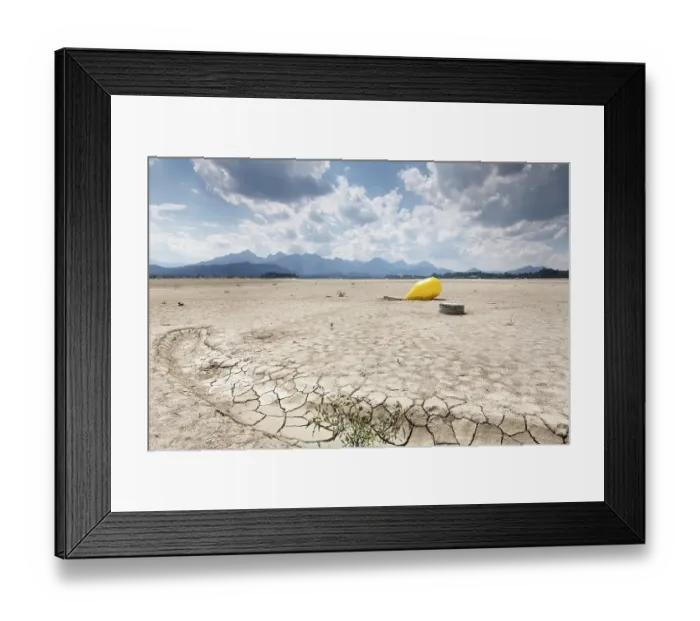 Framed Print : Buoy in the waterless Forggensee in Ostallgaeu
