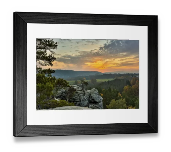 Framed Print : Sunrise in the mountains with a rocky peak in the foreground