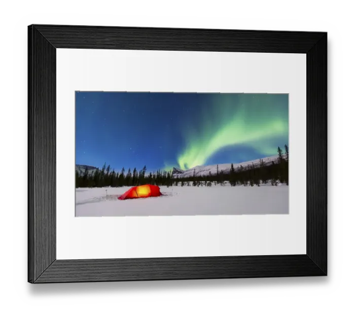 Framed Print : Northern Lights (Aurora borealis) above a red illuminated tent in winter Framed Print : Northern Lights (Aurora borealis) above a red illuminated tent in winter