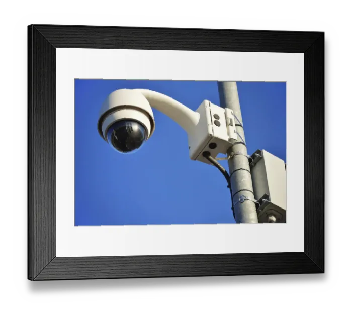 Framed Print : Hi-tech dome type camera over a blue sky