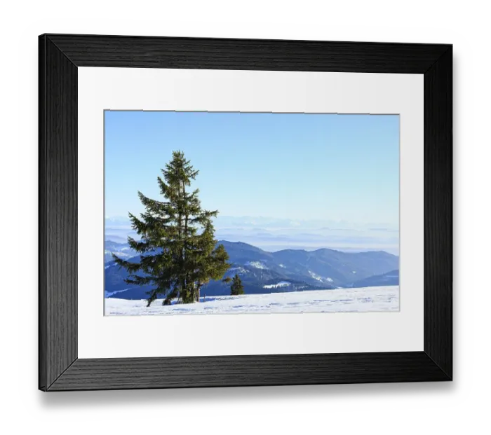 Framed Print : View from the snow-covered summit of the Belchen to mountain ranges and alpine chain Black Forest