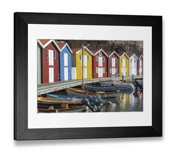 Framed Print : Fishing boats and colourful boathouses