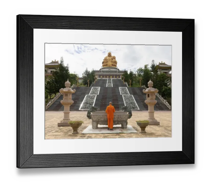 Framed Print : Happy Buddha, monk at an altar