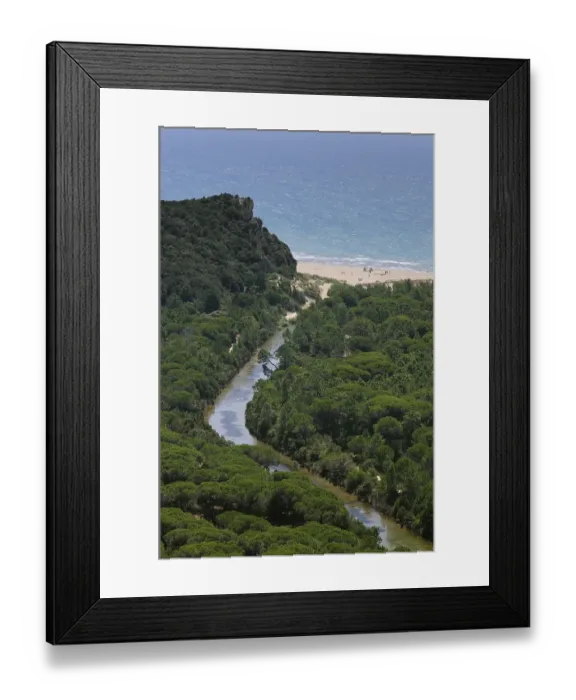 Framed Print : Drainage channel and a sandy beach in the Maremma Natural Park Framed Print : Drainage channel and a sandy beach in the Maremma Natural Park
