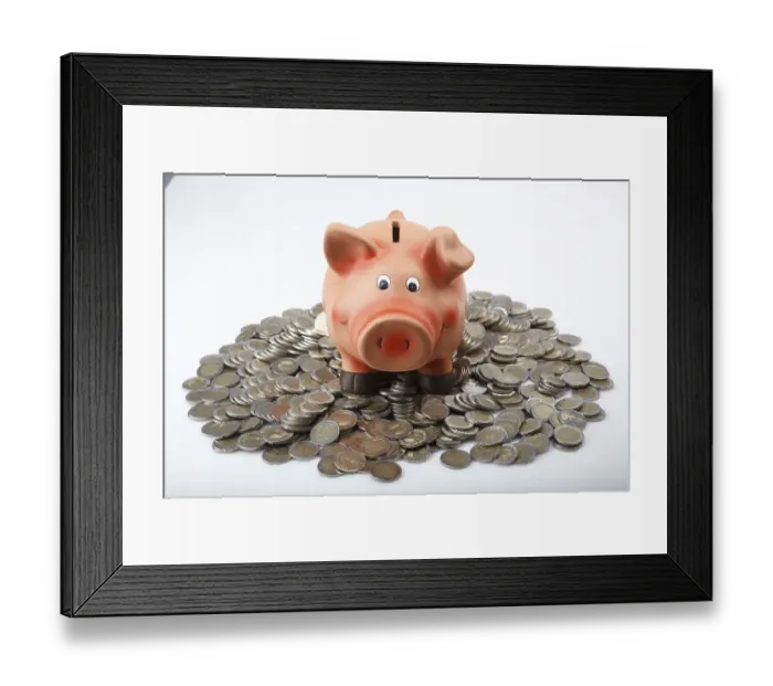 Framed Print : Piggy bank on a pile of euro coins