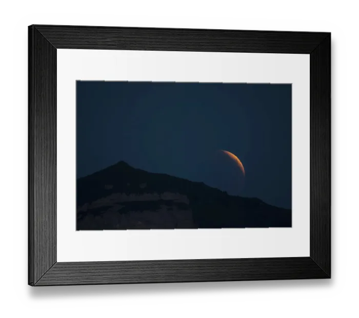 Framed Print : Lunar eclipse above the mountain station of Hohen Kasten