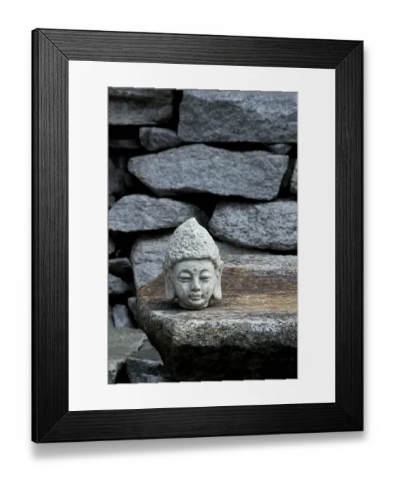 Framed Print : Buddha head on stone slab