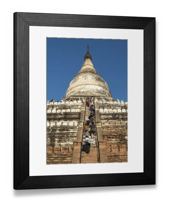 Framed Print : Visitors climb steep steps of Shwesandaw Pagoda