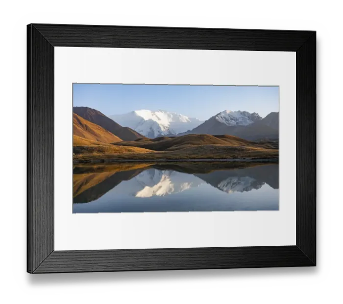 Framed Print : White glaciated and snowy mountain peak Pik Lenin at sunset Framed Print : White glaciated and snowy mountain peak Pik Lenin at sunset
