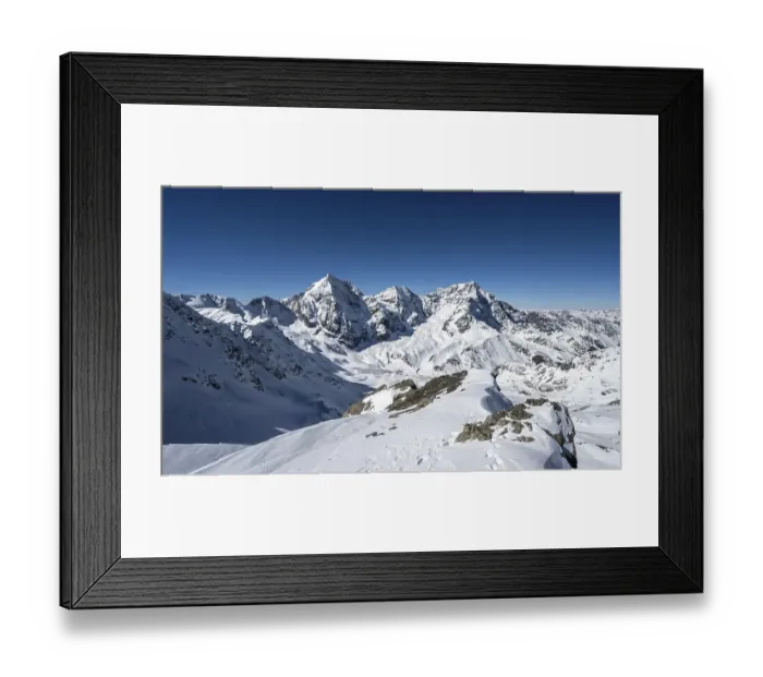 Framed Print : Mountain panorama with snow-covered mountain landscape in winter