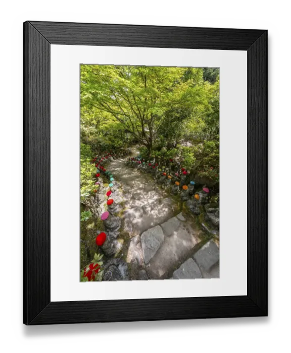 Framed Print : Buddha statue with colorful caps