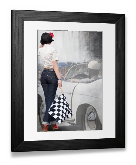 Framed Print : Starter girl standing next to a classic car