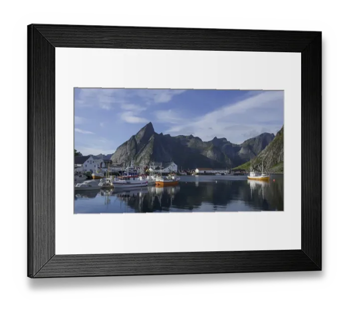 Framed Print : Sheltered harbour and high mountains