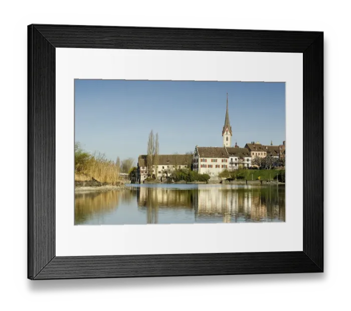Framed Print : View as seen from Werd island across the Rhine river with the historic district of Stein am Rhein