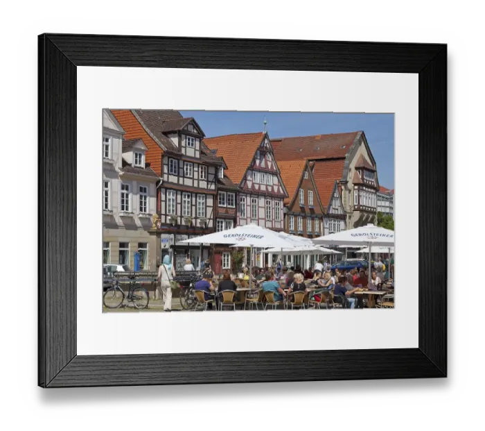 Framed Print : Sidewalk cafe in front of half-timbered houses Framed Print : Sidewalk cafe in front of half-timbered houses