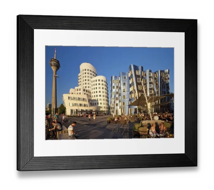 Framed Print : Neuer Zollhof with Gehry buildings and the Rhine Tower Framed Print : Neuer Zollhof with Gehry buildings and the Rhine Tower