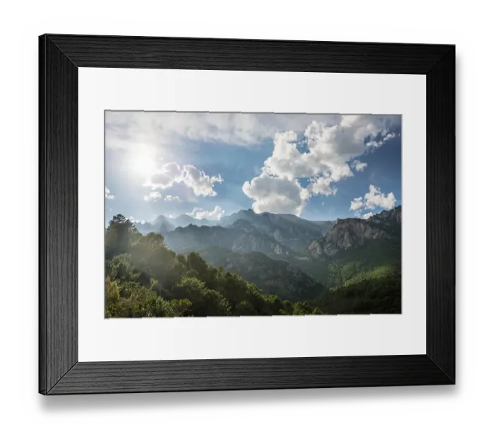 Framed Print : Rocky landscape, pine trees, cloudy sky