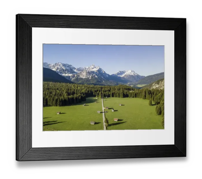 Framed Print : Hay barns in a meadow, Ehrwalder Sonnenspitz and mountains Framed Print : Hay barns in a meadow, Ehrwalder Sonnenspitz and mountains
