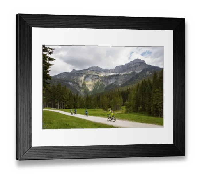 Framed Print : Mountain bikers at the Blaa Alm