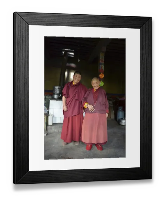 Framed Print : Two Buddhist nuns, one middle-aged woman