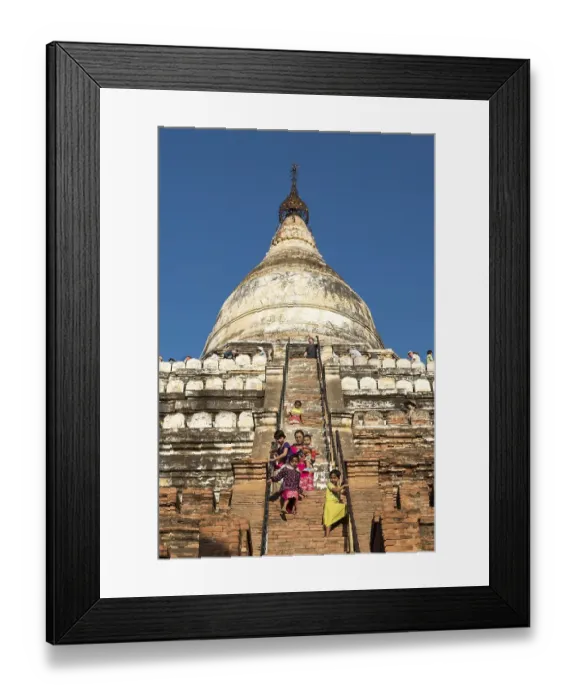 Framed Print : Visitors climb steep steps of Shwesandaw Pagoda Framed Print : Visitors climb steep steps of Shwesandaw Pagoda