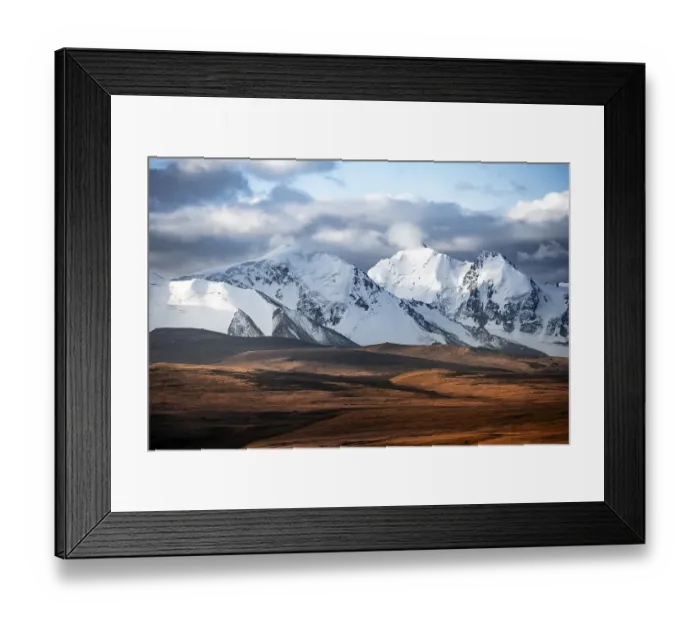 Framed Print : Glaciated and snow-covered mountains
