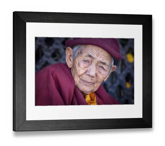 Framed Print : Elderly female Buddhist nun at Boudhanath stupa Framed Print : Elderly female Buddhist nun at Boudhanath stupa