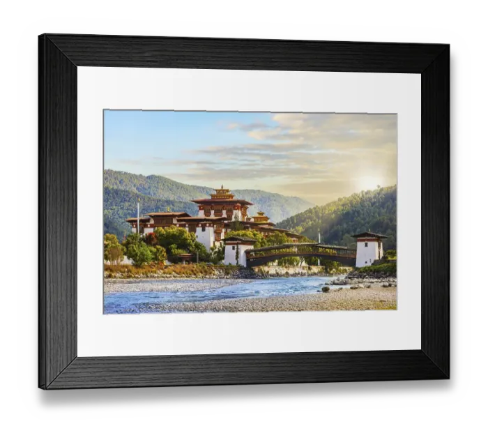 Framed Print : The famous Punakha Dzong with the wooden bridge