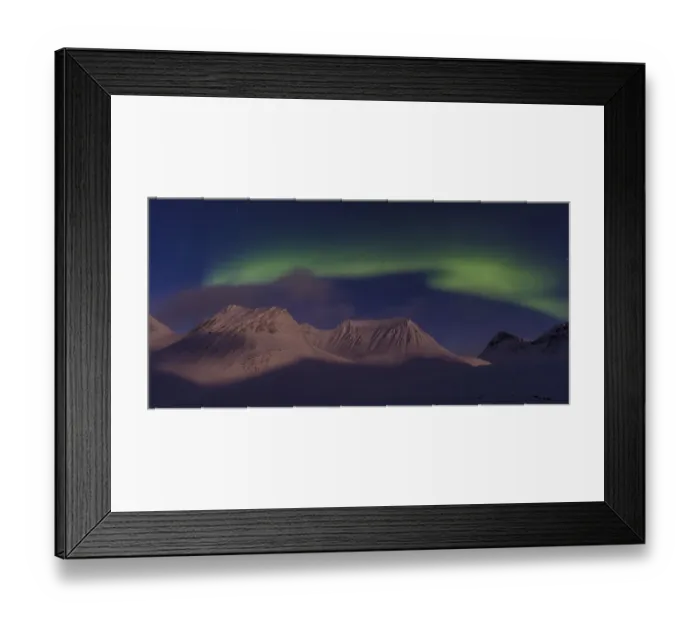 Framed Print : Northern Lights (Aurora borealis) over moonlit mountains in the valley Stuor Reaiddavaggi