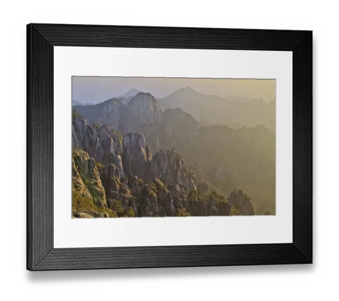 Framed Print : View of mountain range with granite peaks at sunrise