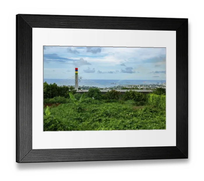 Framed Print : A highway with Mauritian emblem on pillar and a truck driving Framed Print : A highway with Mauritian emblem on pillar and a truck driving