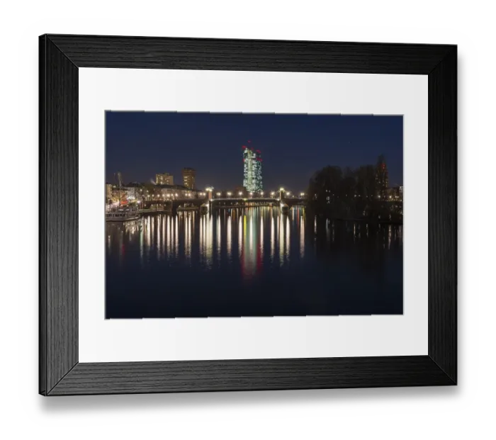 Framed Print : View from the Eiserner Steg over the River Main to the illuminated European Central Bank at night