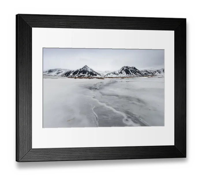 Framed Print : Icy landscape, volcanic black mountains with snow