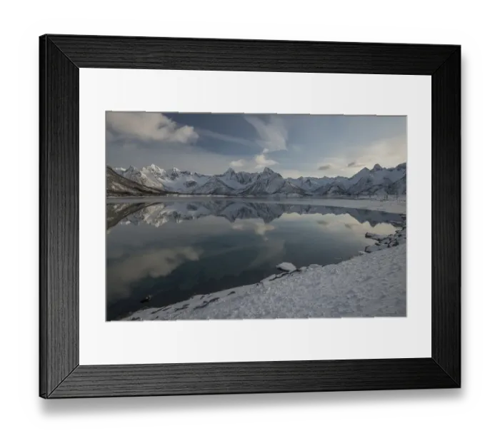 Framed Print : Snowy mountains reflected in the water
