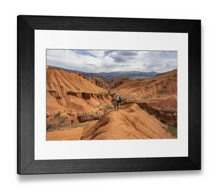 Framed Print : Mountaineer on a mountain ridge