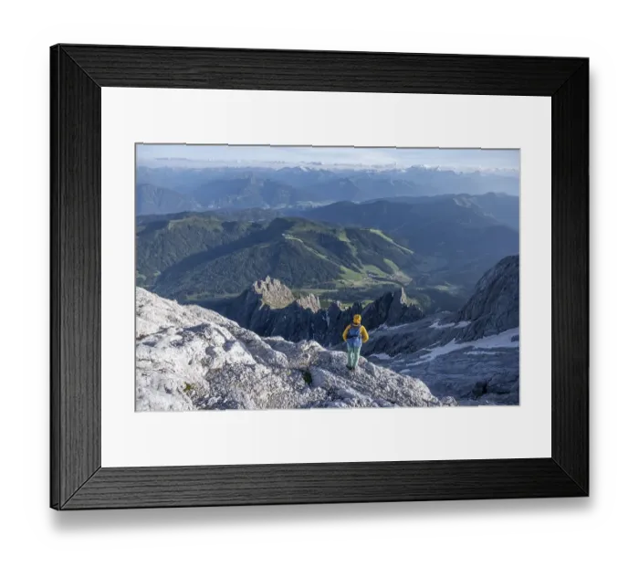 Framed Print : Hiker Looking down into the valley from the Hochkoenig