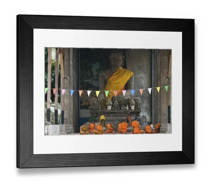 Framed Print : Buddhist monks inside a temple