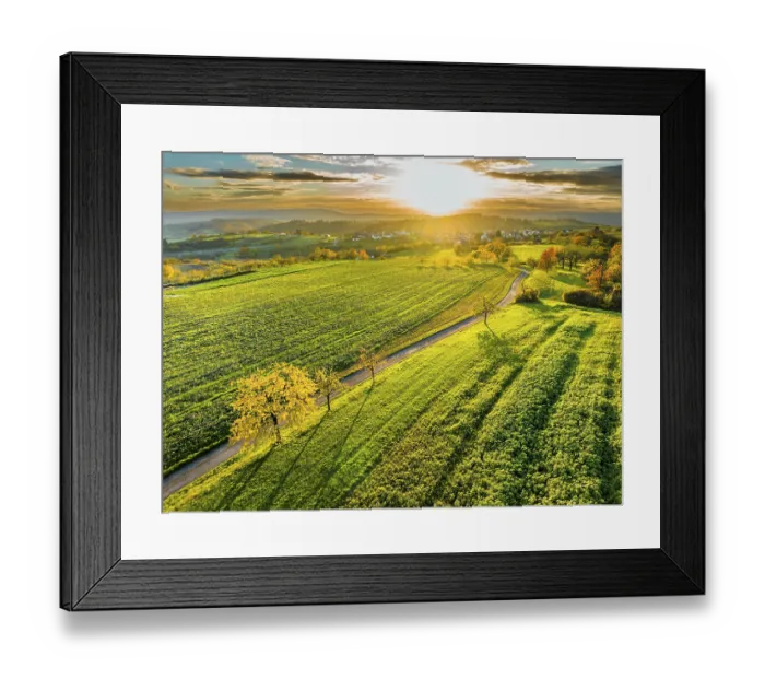 Framed Print : Drone view of sundown over forest and rural landscape in autumn Framed Print : Drone view of sundown over forest and rural landscape in autumn
