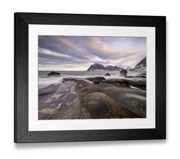 Framed Print : Rocks at Utakleiv beach with rock formation Eye of Utakleiv Framed Print : Rocks at Utakleiv beach with rock formation Eye of Utakleiv