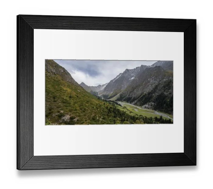 Framed Print : Green mountain valley with river and steep mountain peaks Framed Print : Green mountain valley with river and steep mountain peaks