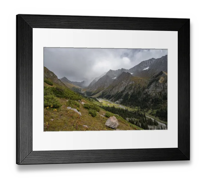 Framed Print : Green mountain valley with river and steep mountain peaks